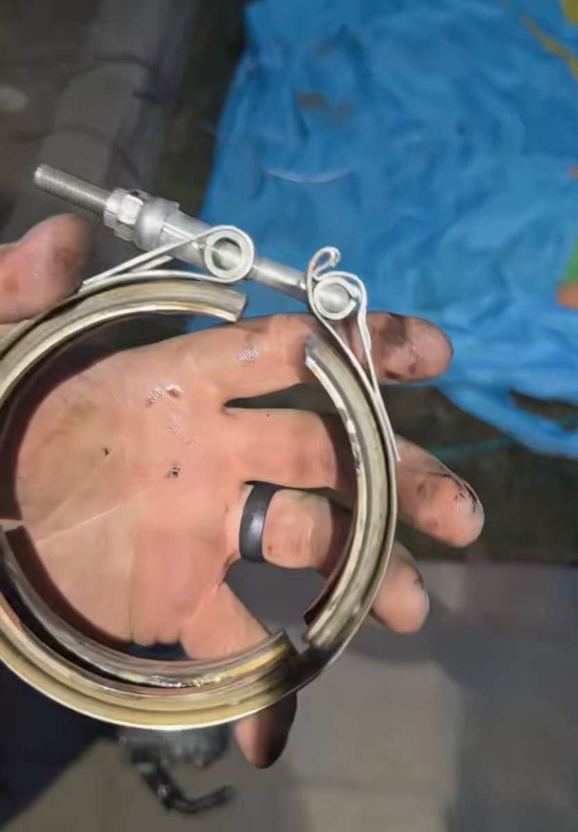 V-band clamp that was modified to force it to fit