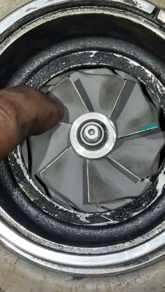 Worn turbocharger compressor wheel