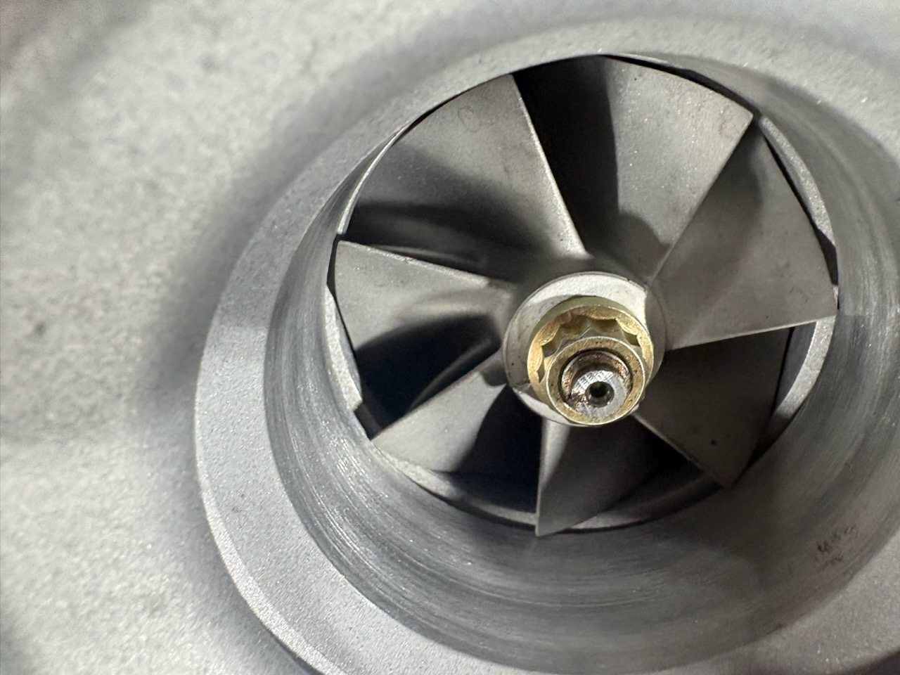 Correct compressor wheel to housing clearance on a factory turbo